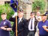 The Liverpool Scottish Association standard party marching away from Noel Chavasse’s grave: L to R H